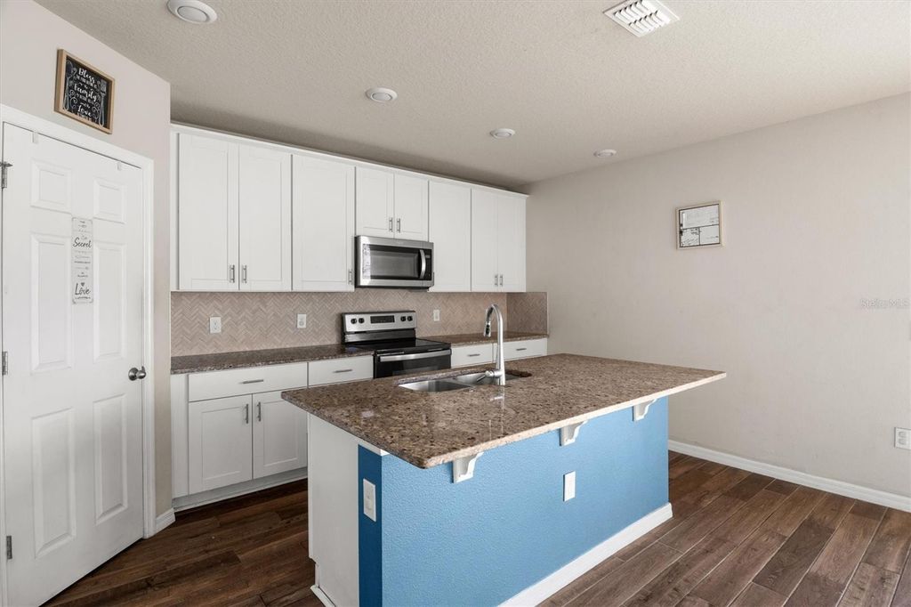 Photo of 884 Cambridge Drive, Winter Haven, FL 33881 (MLS # TB8502061)