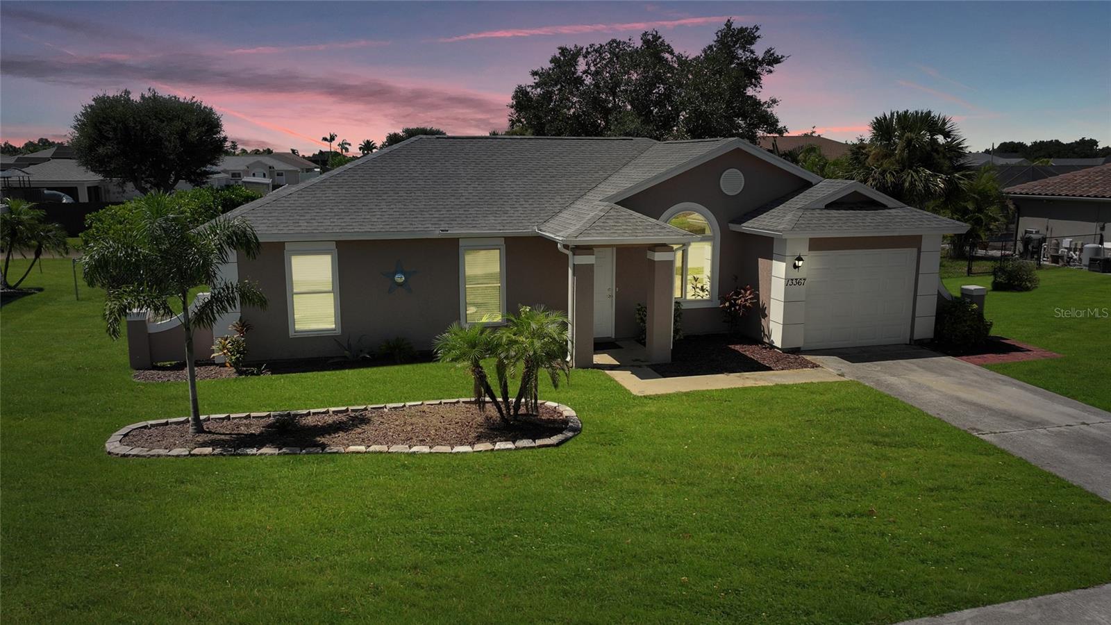 Move-in ready 3-bedroom, 2-bathroom single-family home with 1-car garage located in the desirable Gardens of Gulf Cove. Built in 1989 and offering 1,236 sq. ft. of living space, this home features a spacious living/dining room combo with cathedral ceilings, an open kitchen, and a bright, Florida-style layout.
Enjoy outdoor living with a large fenced backyard, paved patio, new shed (2016), and lake view. A newer roof, hurricane impact windows and garage door, and a new roof (2020) provide peace of mind.
More updates include: (2020) New roof & breaker panel, (2016) Impact garage door, whole house re-pipe, water heater, shed, (2015) Hurricane impact windows & slider, (2014) High-efficiency AC, (2024) New screen on back slab.
The Gardens of Gulf Cove offers resort-style amenities include 2 community pools, tennis courts, fitness center, recreation center, sidewalks, 4 lakes, and underground utilities. Boat/RV storage is available for an additional fee.
Conveniently located between Port Charlotte and Englewood, close to shopping, dining, golf, boating, and Gulf beaches.