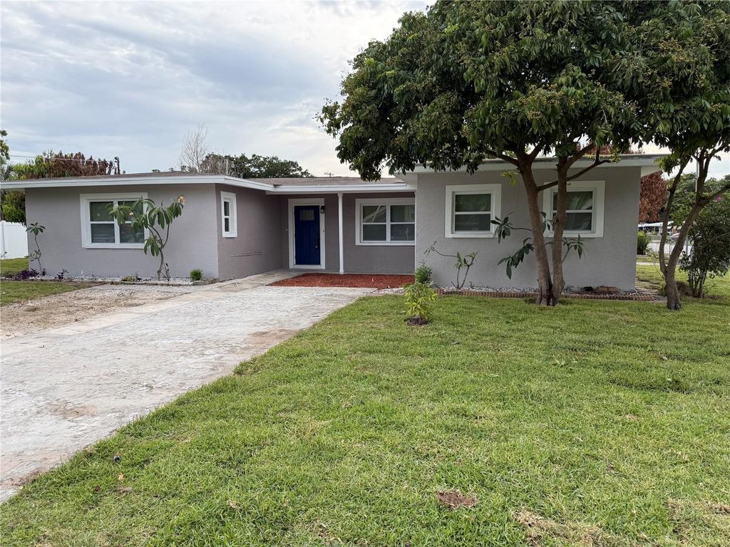 Photo of 7005 Thrasher Drive, Tampa, FL 33610 (MLS # TB8512792)