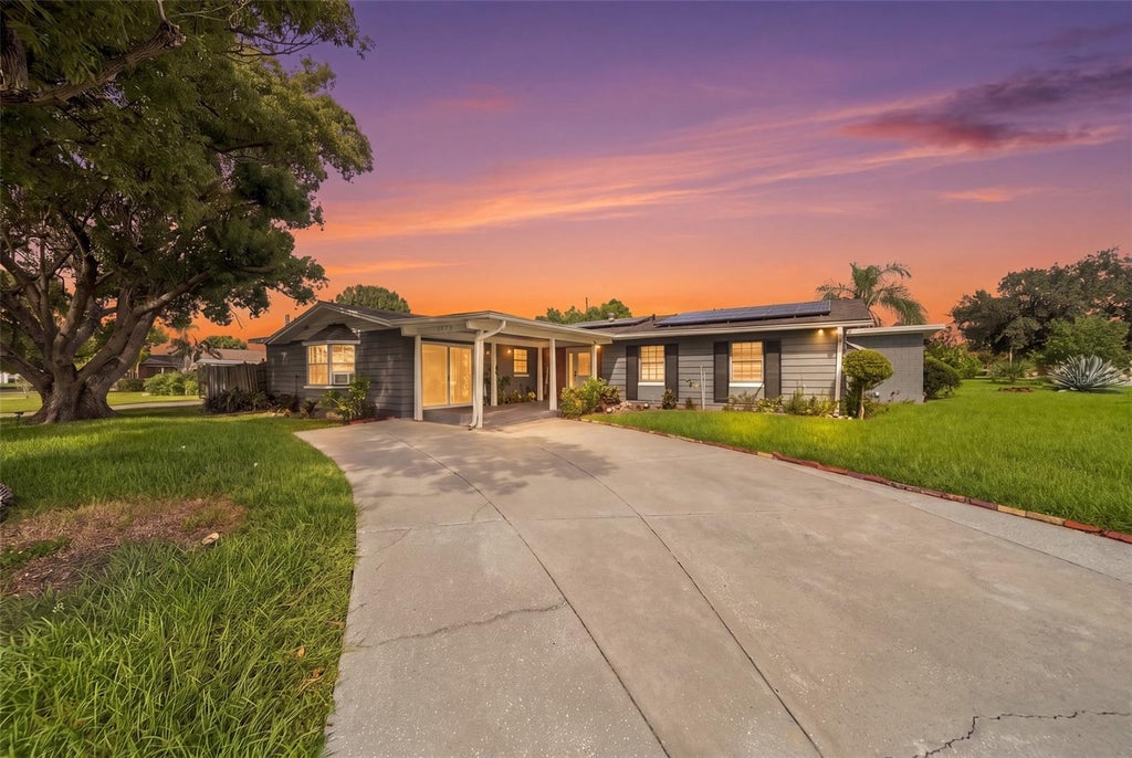 Photo of 6525 Voltaire Drive, Orlando, FL 32809 (MLS # O6444004)
