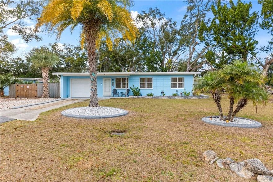 Move-in ready and thoughtfully updated, this 3-bedroom, 1-bath concrete block home with a 1-car garage offers comfort, functionality, and lasting value. Situated on a spacious 100x90 corner lot, the property showcases classic Florida appeal paired with smart modern upgrades.
Recent improvements include fresh full exterior paint and an updated bathroom, enhancing the home’s turnkey appeal. Inside, abundant natural light highlights durable hard-surface flooring, updated lighting, paneled doors, and a refreshed bathroom with clean, modern finishes. The kitchen is well equipped with stainless steel appliances and granite countertops, providing both style and everyday practicality.
The fully fenced yard offers excellent flexibility, with ample space for additional vehicle or boat parking along the side of the home. The backyard is designed for easy, low-maintenance living with artificial turf ideal for entertaining, pets, or relaxing outdoors. Major systems have already been addressed, including a 2021 roof, 2019 HVAC system, and updated electrical panel, offering buyers peace of mind and reduced future maintenance. Conveniently located near shopping, dining, major roadways, and the beach, this property presents an excellent opportunity for homeowners or investors alike. All information taken from the tax record, and while deemed reliable, cannot be guaranteed.