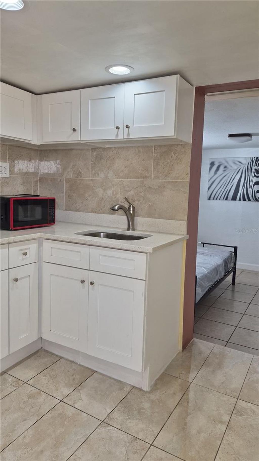 Photo of 2411 S Ramona Circle, Tampa, FL 33612 (MLS # TB8477985)