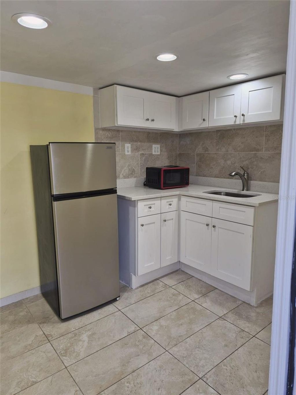 Photo of 2411 S Ramona Circle, Tampa, FL 33612 (MLS # TB8477985)