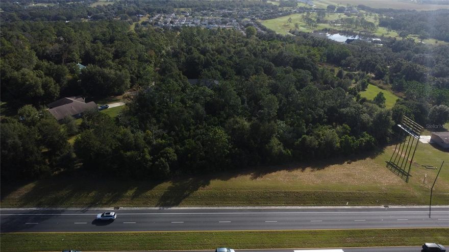 Zephyrhills Colony Company Lands 2 acre lot (est). A Survey has been ordered to verify. One of the highest elevations in the Tampa area. Directly across from Greer Hill with an elevation of over 200 feet. About 2 heavily wooded acres next to Scotland Yards Golf Club with highway 301 frontage. There are very few lots available in this highly desirable neighborhood in this wooded area. Neighboring homes are estimated between $500k and $1.5M with a beautiful view of Zephyrhills. The property is less then 2 miles from Advent Health Zephyrhills Hospital and about 50 places to get dinner. Publix Super Market and Lowe’s Home Improvement are just a bit over a mile away. Zephyrhills is a truly beautiful, historic and clean town and is less then 10 miles from I-75 or I-4 and about 20 miles to Tampa or the Gulf of America pristine beaches. see drone video of the property and area in the virtual tour and more areal videos available on request.