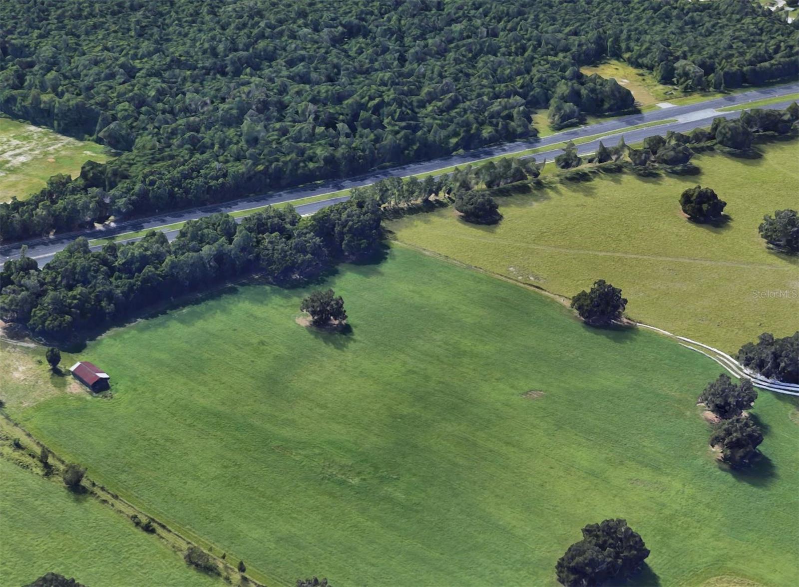 High-Visibility Commercial Parcel – U.S. Highway 41, Brooksville, FL
This nearly 2-acre parcel offers approximately 404 feet of visual frontage along U.S. Highway 41 (Broad Street)—Brooksville’s main north-south corridor. Strategically located in a growing commercial district, this high and dry site lies outside of any flood hazard area, making it ideal for retail, office, or service-based development.
Access & Frontage
Though addressed as U.S. Highway 41, a narrow, non-developable strip lies between the property and the highway itself. Access is provided at the southern boundary via a 50-foot-wide county-maintained road.
Zoning Flexibility
The parcel is zoned R-1B, but the sellers have already rezoned adjacent land across the highway to C-3 (Neighborhood Commercial). They retained the R-1B zoning on this parcel to allow the buyer to pursue the classification best suited to their intended use. A C-3 classification would align well with surrounding commercial uses and anticipated development in the area.
C-3 Permitted Uses Include:
• Neighborhood convenience stores (max 2 checkout lanes, 2 fuel pumps)
• Personal service establishments (salons, dry cleaners, etc.)
• Professional, business, nonprofit, and public offices
• Utility facilities
• Liquor/package sales and restaurant beverage service
• Delis and restaurants (=40 seats)
• One single-family dwelling (600+ sq. ft.) integrated into a business
• Day care centers and nursing care homes
Traffic & Visibility
• Approximately 27,000 vehicles per day (AADT - FDOT)
• Excellent exposure along a major regional thoroughfare
Nearby Businesses & Amenities
Surrounded by national retailers and local services, including:
• Lowe’s, Walmart Supercenter, Tractor Supply
• Nick Nicholas Ford, Capital City Bank, CVS, Walgreens
• Publix, Advance Auto Parts, and others
• Minutes to Downtown Brooksville, courthouse, and county offices
Residential Growth & Demand
Close to several large residential communities:
• Southern Hills Plantation (gated golf community)
• Brookridge, Trillium, and Sherman Hills
This growing population base increases demand for nearby commercial services.
Strategic Location
• 0.5 miles to SR-50 (Cortez Blvd)
• 2 miles to U.S. Highway 98
• 5 miles to Suncoast Parkway (SR-589)
• 8 miles to I-75 via SR-50
• 10 minutes to Brooksville–Tampa Bay Regional Airport (BKV)
• 55 minutes to Tampa International Airport
Central Florida Reach
• 45 miles to Tampa
• 60 miles to St. Petersburg
• 58 miles to Clearwater
• 85 miles to Orlando
This is a standout opportunity to acquire a commercially positioned parcel with excellent visibility, flexible development options, and strategic access to key residential and commercial markets.