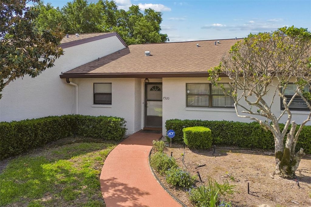 Photo of 7920 Radcliffe Circle, Port Richey, FL 34668 (MLS # TB8497843)