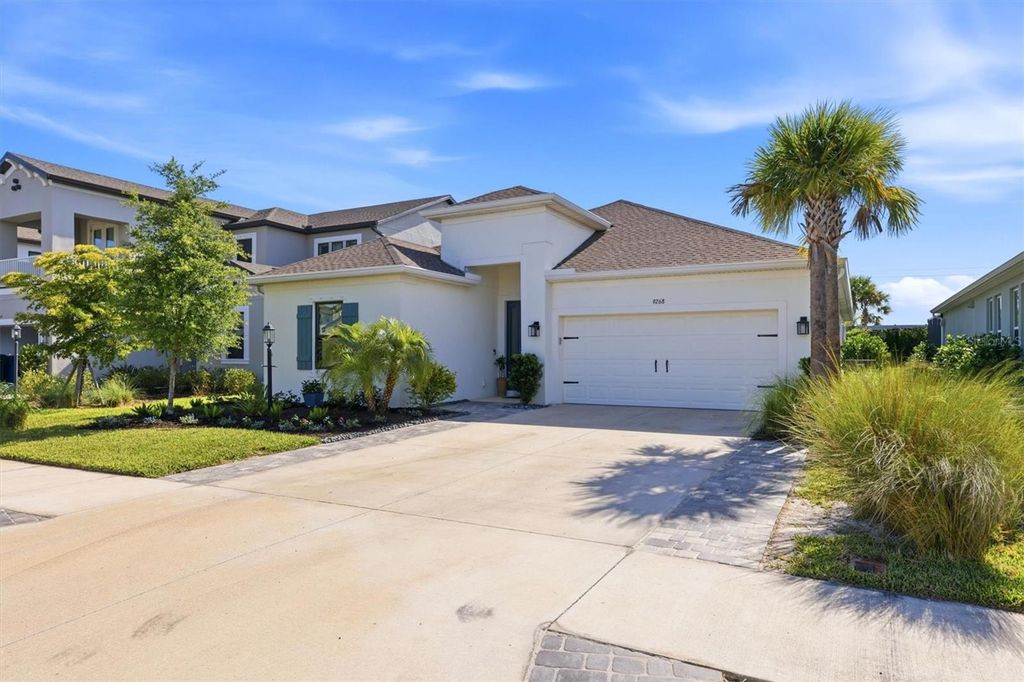 Photo of 9268 Tequila Sunrise Drive, Sarasota, FL 34241 (MLS # A4689486)