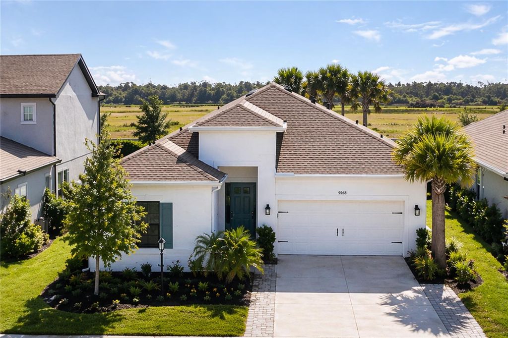Photo of 9268 Tequila Sunrise Drive, Sarasota, FL 34241 (MLS # A4689486)