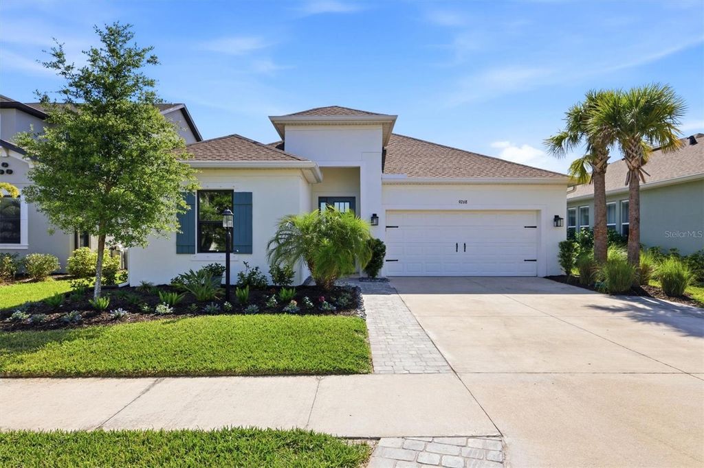 Photo of 9268 Tequila Sunrise Drive, Sarasota, FL 34241 (MLS # A4689486)