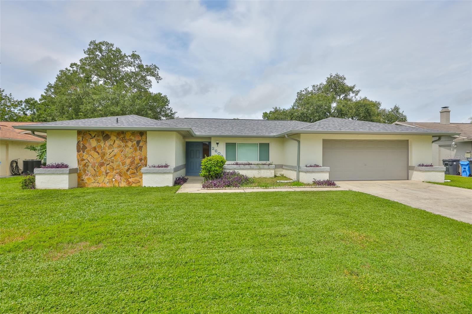 Welcome to your next chapter in comfort and convenience. This freshly updated four-bedroom, two-bath home offers nearly 2,000 square feet of well-thought-out space, with a smart split-bedroom layout that gives everyone the privacy they crave. Whether you're hosting a lively gathering or enjoying a peaceful evening, this home is designed to meet your every need.
Step into the heart of the home, the updated kitchen, featuring granite countertops, newer appliances, and a layout spacious enough for both quick morning breakfasts and weekend baking marathons. The open-plan flow moves seamlessly into the dining and living areas, perfect for both quiet nights and lively celebrations.
The primary bedroom is a true retreat, tucked away for peace and privacy. With generous space, a walk-in closet, and a bathroom that offers relaxation after a long day, it's the kind of room you look forward to coming home to. Three additional bedrooms are well-sized and thoughtfully placed on the opposite side of the house, ideal for family, guests, or even a dedicated home office.
Outside, enjoy the best of Florida living with a large, fully fenced yard. The lot is beautifully landscaped, featuring a well-manicured lawn and flowering trees that bring life and color throughout the seasons. Whether you're gardening, letting the dog run free, or just relaxing under the shade, the outdoor space is both functional and inviting.
The property sits on a spacious lot without the burden of pass-through fees or overbearing neighborhood rules, no homeowner association or community development district here. It's the freedom of ownership you've been looking for with the convenience of a well-maintained community.
The location offers quiet living without sacrificing access to everyday essentials. A nearby grocery store, just over a half-mile away, means you'll never need to stress over last-minute dinner plans. Families will appreciate the close proximity to local schools, including a popular nearby academy just a short walk away. Parks and community centers are also within a few minutes drive, perfect for weekend family fun or energetic morning jogs.
If commuting is part of your routine, you'll be glad to know this home is just minutes from major highways, making travel to nearby cities smooth and manageable. Add the fact that the roof was replaced in 2023 and you'll find peace of mind with one less thing on your to-do list.
Whether you're upsizing, rightsizing, or simply relocating, this home strikes a thoughtful balance between modern updates, space to grow, and a location that supports busy lifestyles and quiet moments alike. Don't miss your chance to make it yours, homes like this, with space, style, and serenity, tend not to stick around for long.
