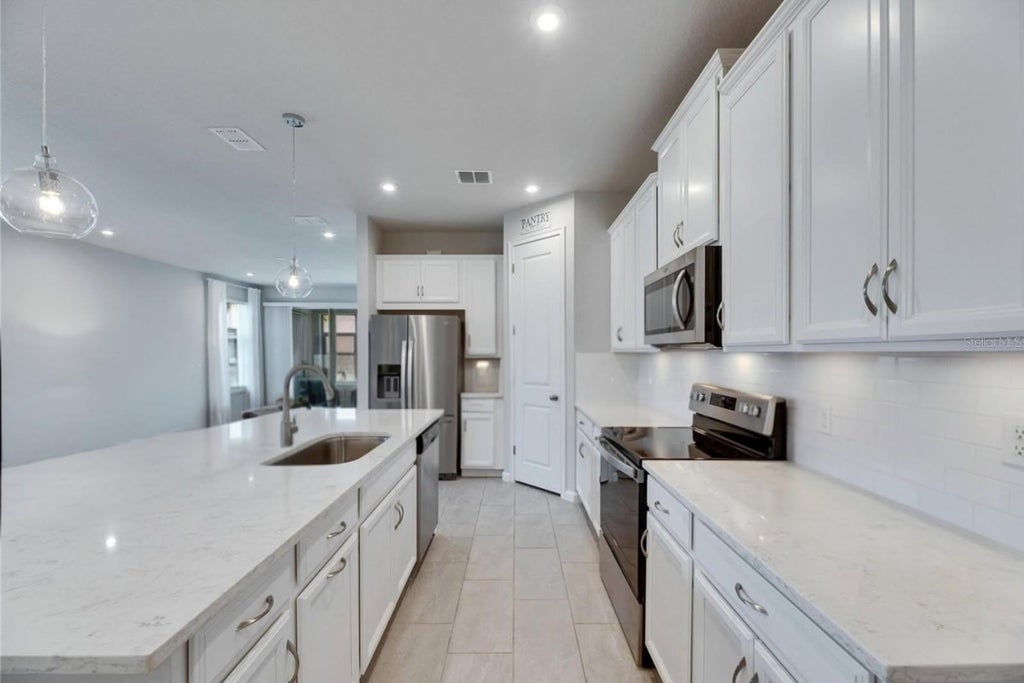 Photo of 3719 Laughing Dove Avenue, Sun City Center, FL 33573 (MLS # TB8532353)