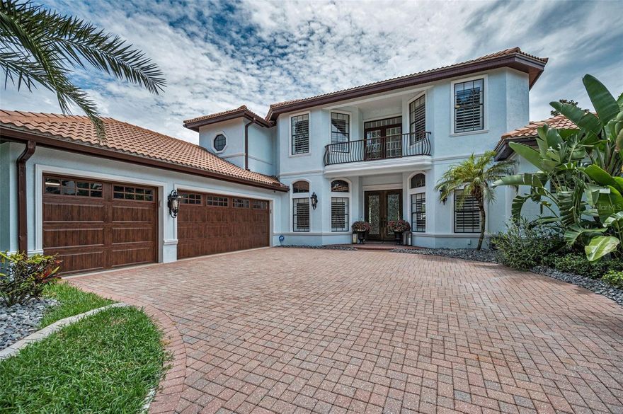 INCREDIBLE PRICE REDUCTION! Schedule your SHOWING TODAY! WELCOME HOME to this beautiful, elegant, executive style residence. Located in the AMAZING Champions Club-Trinity! This newly renovated 4/4/3 with pool, located in the sought out, heart of Trinity. A rated schools.  This one will leave you speechless. This home is adorned with so many impressive unique features. As you walk up the beautifully pavered drive, you will be greeted with the decadent CUSTOM WOOD FRENCH DOUBLE DOORS ENTRYWAY. Your first step inside will lead into the vestibule, where you will experience the warmth, beauty and style of the GRANDIOSE chandelier along with polished MARBLE tile throughout the first floor. Your immediate attention will be drawn to the soaring ceilings, elegant chandeliers, hand crafted columns, detailed balusters spindles up the stairs,  along with hardwood risers that lead up to the loft area, which also is adorned with real hardwood flooring and the same baluster spindles over looking the formal living room. Enjoy incredible built ins, and a full wall fire place and so much more! The kitchen in perfect. The large island is adorned with Calcutta Quartz which waterfalls for a smooth stylish look, along with a porcelain etched farm sink.  The cabinetry is beyond perfect, with 42 inch cabinets and leaded glass uppers, to add even more class and charm. The gold and onyx pendant fixtures were purposely selected to bring  modern day charm with a sleek look to this farmhouse chic look. As you meander throughout the home you will embrace how well the floor plan moves. Perfect for, family gatherings, entertaining, relaxing or just about any lifestyle. Each room has been intentionally designed with great character and intent.   Everything in the home has been thoughtfully renovated. Kitchen, all 4 baths, all 4 bedrooms, pool, pool decking,  every faucet, door handle, handle, hinge or metal has been updated to the trending matte onyx. The primary suite overlooks the beautiful pool area. And is suited with a well appointed bathroom. His and Hers closets and sinks, cosmetic vanity space, unique copper basins, Venetian tub, stylish chandeliers  and lighting, classy Italian porcelain tile shower, elegant mirrors and so much more. The family room is nestled off the kitchen and adds for a large cozy area to relax in. The entertainment wall is custom with shelving and a faux electric fireplace to add to the ambiance. The upstairs has a full-size loft with a beautiful wet bar for entertaining. The 2nd floor has 2 bedrooms and a full bath. There are French doors that lead out to the charming balcony that overlooks the entry to the home. A great place to relax on breezy evenings. Champions clubhouse is one of Pasco Counties premier clubhouses. Beautifully design with elegant architecture, It has a state of the art gym, rentable space for your next party, big community swimming pool, meticulously maintain landscaping, on a golf course. THIS ONE IS AN ABSOLUTE SHOW STOPPER AND A MUST SEE! Every detail has been thoughtfully updated and it shows. And let's talk about the location.  Centrally located with easy access to all 4 counties. Major road ways for easy access to everything. Airports, hospitals, shopping, restaurants, and yet away from the bustle and hustle. You just cannot MISS this one. BEING SOLD FURNISHED.  PLEASE READ THE REALTOR REMARKS AC HOT WATER HEATER 2025. POOL EQUIPMENT 2024.