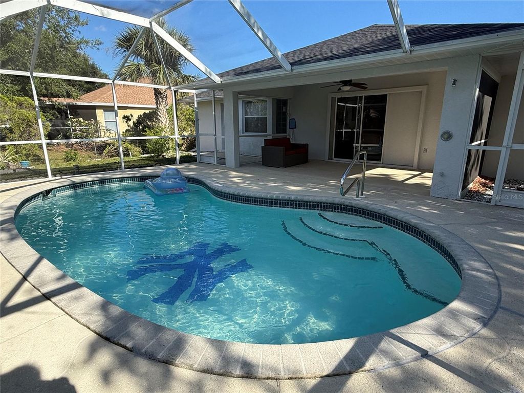 Photo of 21498 Beaverton Avenue, Port Charlotte, FL 33952 (MLS # A4653928)