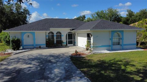 Photo of 21498 Beaverton Avenue, Port Charlotte, FL 33952 (MLS # A4653928)