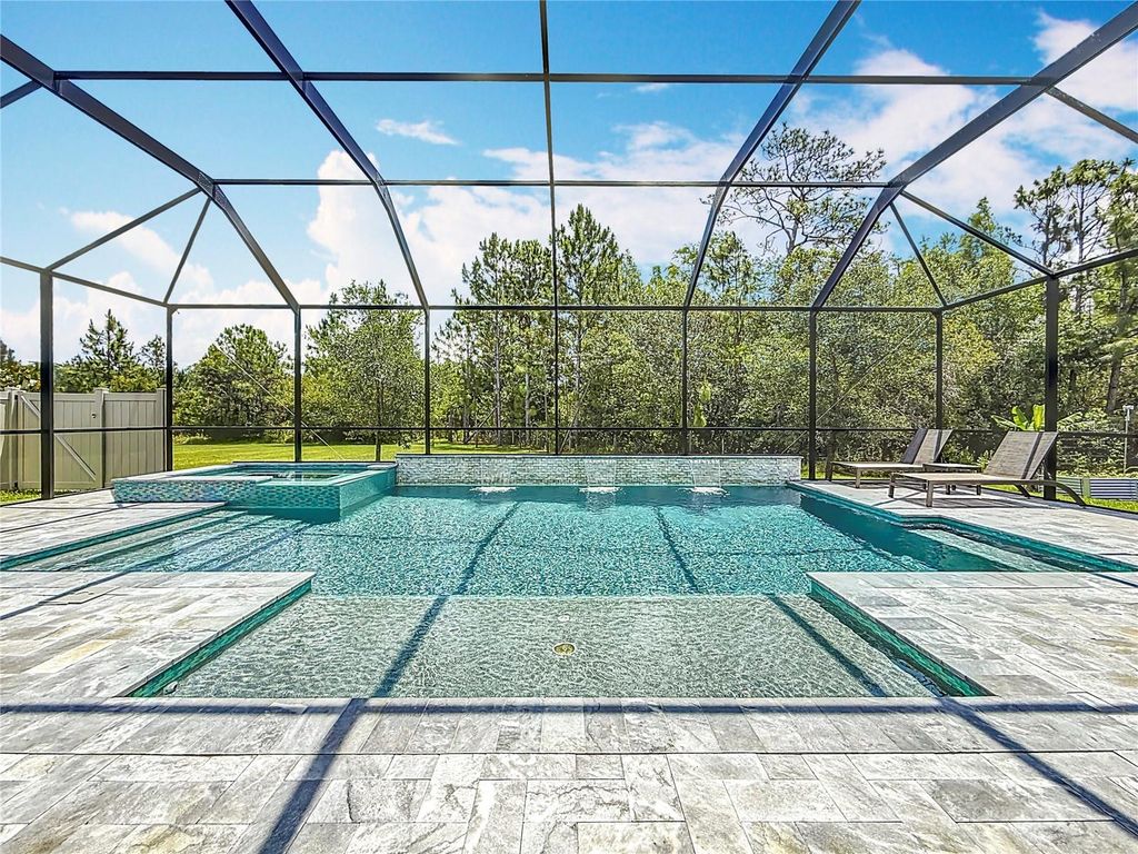 Photo of 18203 Pine Hammock Boulevard, Lutz, FL 33548 (MLS # TB8380401)