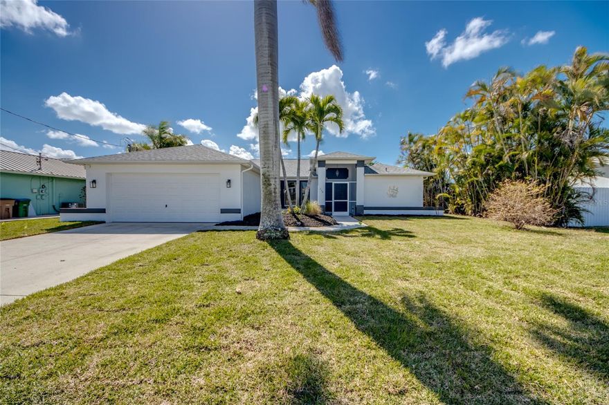 Welcome to your dream home in Cape Coral! This stunning single-family home boasts 3 bedrooms, 2 bathrooms, and a 2-car garage, perfect for a growing family or those who love to entertain. The in-ground pool is the perfect spot to cool off on hot summer days, while the porch offers a peaceful retreat to enjoy your morning coffee or evening sunsets. The interior features formica counters, stainless steel appliances, and tile flooring, giving the home a modern and sleek feel. The newer AC ensures you stay comfortable year-round, while the auto sprinklers make maintaining the lush landscaping a breeze, the fenced yard is perfect for your fevorite pets. Located in a great neighborhood, you'll feel right at home from the moment you step inside. Don't miss your chance to own this gem in Cape Coral - schedule a showing today and make this house your forever home!