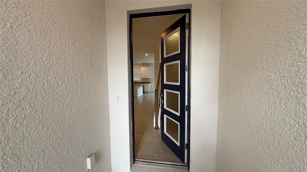Photo of 1155 Boardwalk Pl #1155, Kissimmee, FL 34747 (MLS # O6427774)