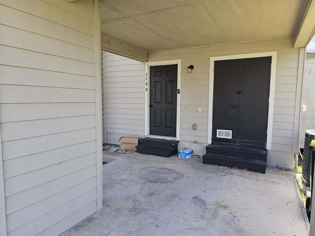 Photo of 1108 Country Club Lane, Lakeland, FL 33801 (MLS # TB8522933)