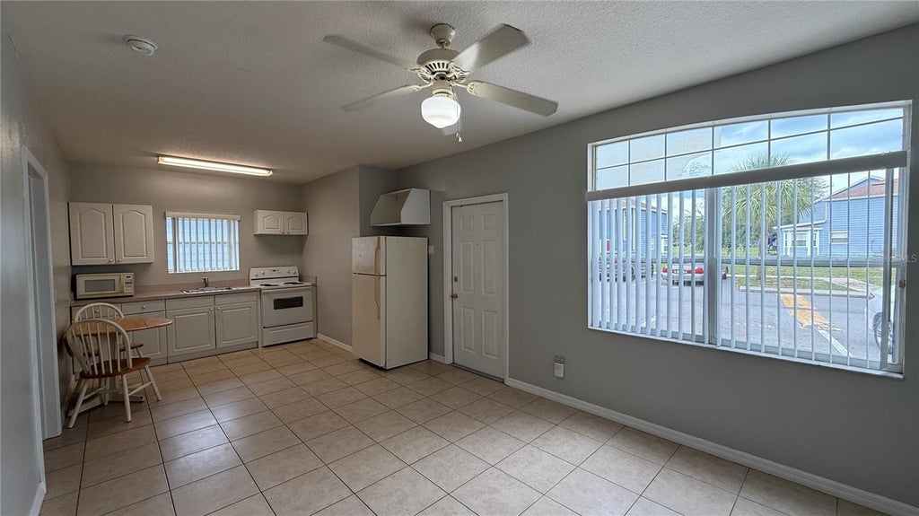 Photo of 627 Orchid Drive, Davenport, FL 33897 (MLS # O6429392)