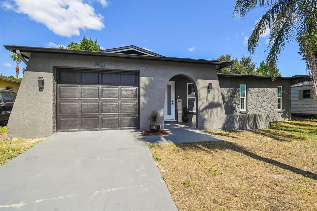 Photo of 8411 Paxton Drive, Port Richey, FL 34668 (MLS # TB8438823)