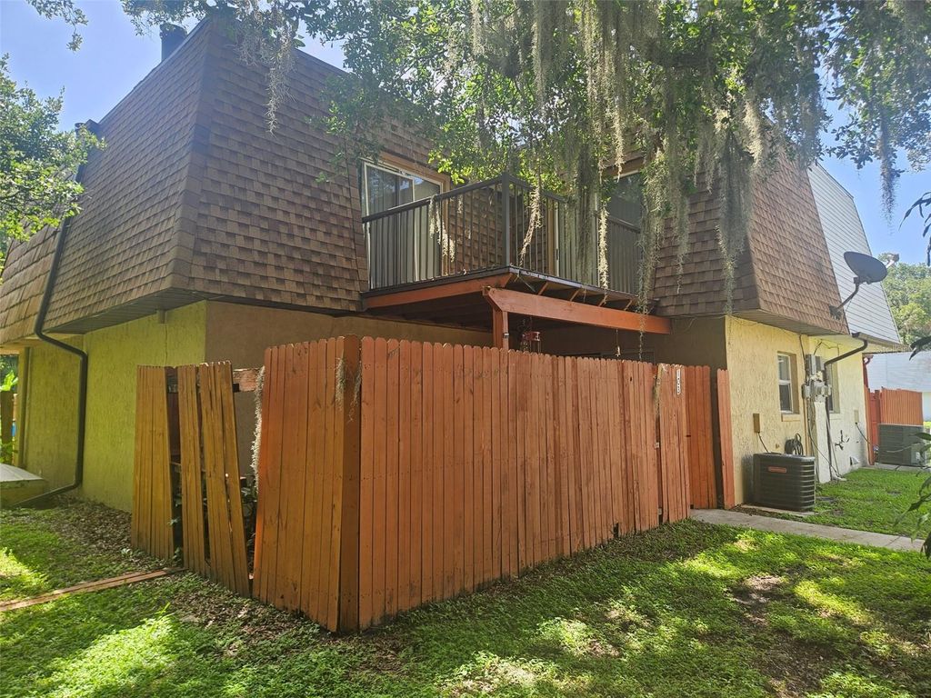 Photo of 103 Springwood Square, Port Orange, FL 32129 (MLS # NS1085463)