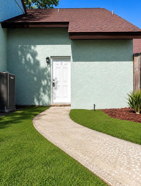 Photo of 12414 Touchton Drive #98, Tampa, FL 33617 (MLS # TB8538403)