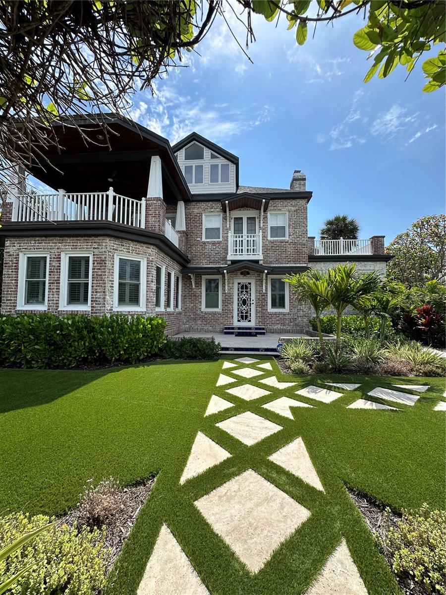 A Legacy on Eldorado Avenue - Where Timeless Elegance Meets Coastal Grandeur
A rare offering in one of Clearwater Beach’s most coveted neighborhoods, North Beach— this iconic estate is where timeless architecture and elevated design are sure to lure you in with the feeling of beachfront living since you are directly across the street from the beach access and have views of the Gulf from all three floors of this stately home.
Built in 1935 by a prominent cigar manufacture, this home is a legacy of craftsmanship and refinement—graced with original detailing like exposed brick, crown moldings, custom built-ins, and chandelier medallions— seamlessly updated with today’s luxury finishes. From the moment you step inside, you're met with a sense of history and sophistication that no new build can replicate.
A rooftop terrace, two balconies, and sun-drenched rooms invite you to live every day with the beach as your backdrop. The gourmet kitchen is a dream for the most discerning chef. The formal dining room, adorned with large windows and plenty of room to host large dinner parties, is ideal for elegant gatherings. The sunroom invites natural light through 10 windows with plantation shutters. The home’s finer details have only been improved upon with updated finishes that include refinished hardwood floors, granite counters, and updated bathrooms. All rooms on the first floor are filled with natural light and flow effortlessly when entertaining.
A few steps up from the main floor is the first of the two primary suites. With ultimate privacy, an ensuite bathroom, and access to the basement- where you’ll find additional closet space and the laundry. The second-floor primary suite is an indulgent retreat with its own living area, spa-style marble bath, and California Closets. Just off the bedroom, you’ll find what may be your favorite part of the home: the private oversized balcony with more views of the clear water and white sand. The third bedroom is also on the second floor with its own bathroom and Juliet balcony. The perfect size and view for a home office. At the end of the hall there is a rooftop deck with captivating views of the Gulf. The third-floor bedroom is a private perch with two closets, and panoramic views of the beach.
The home’s exterior has unmatched character with a lush courtyard, pool, spa, laundry, and pool bathroom- thoughtfully placed for privacy and tranquility. The corner lot allows you to enjoy the outdoor space without feeling the intrusion of neighboring properties while steps away from the beach- including a 3-car driveway and a 2-car detached garage. Above the garage you will find a true one bedroom apartment, with its own utilities, laundry, kitchen, and bathroom which adds function without compromise—ideal for long-term guests, staff, or income potential.
Eldorado Ave is one of Clearwater Beach's most beautiful and highly sought after streets for both the quiet privacy and the beach access that is afforded to its homeowners. Down the street from the Carlouel Beach & Yacht Club, a little over a mile from all the action near Pier 60, and a quick drive to Downtown Clearwater and Coachman Park. While this architectural gem is one of North Beach's original grand homes, it’s elevated above most historic properties, providing added peace of mind and enduring value. The charm of this home will captivate and delight you from first glance until the moment you call it your own.