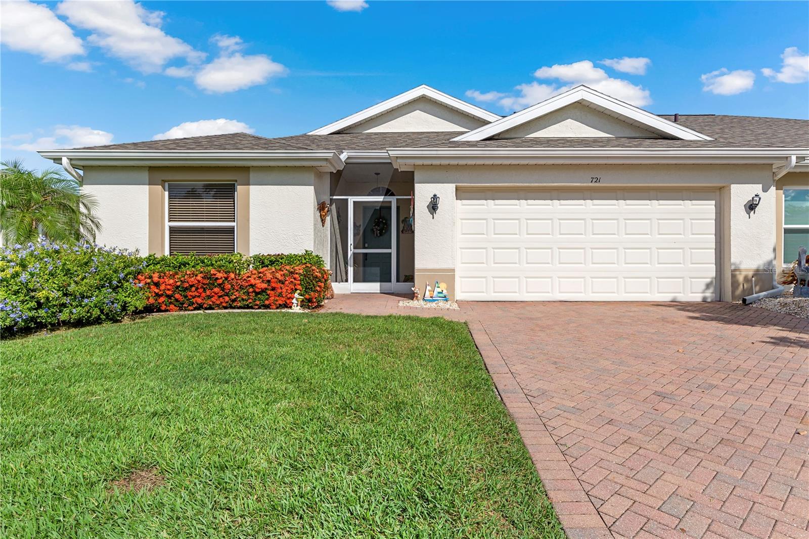 As you enter the enclosed entryway and step into the foyer the first thing that will catch your eye is the private view of the serene pond and nature trails used for walking, biking, and golf cart riding, and often times you will see someone fishing in the pond.This fantastic view can be seen from the Great Room, Kitchen, Florida Room, and Master Bedroom.A unique split bedroom plan adds lots of privacy for company . The Great Room has high ceilings and leads into the L shaped dining room, great for entertaining and dinners, and Florida Room. Neutral decor thru-out with high ceilings, and wood designed porcelain tile in all rooms except foyer, kitchen, and bathrooms which have ceramic tile. The updated kitchen has Granite counters and backsplash(2025) newer garbage disposal(2024) and pantry. Master bedroom has large walk-in closet plus full wall closet. The Master Bath has long mirrored vanity , shower has glass doors, and linen closet. The florida room has 3 doorwalls and extra entry door leading to Bar BQ Grill. All rooms have ceiling fans. Garage has a workbench, pull down ladder to add extra storage, electric car hook-up and washer(07/2025) and dryer. The roof is new (07/2025). There is a transferrable rented parking spot available for RV, Boat, or Car. This gated 55+ community of Kingspoint is called "paradise" by many. Included are 200 clubs, 3 outdoor pools, 2 indoor pools, sauna, hot tubs, theatre, restaurant, library, card and craft rooms, emergency squad, 24 hour security, Pickelball courts, tennis courts, lawn bowling, corn hole and much more. Enjoy your senior years!