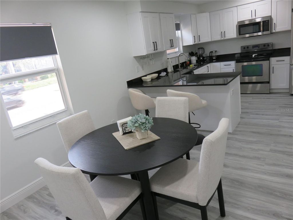 Photo of 5401 Sweetwater Terrace Circle #5401, Tampa, FL 33634 (MLS # TB8502539)