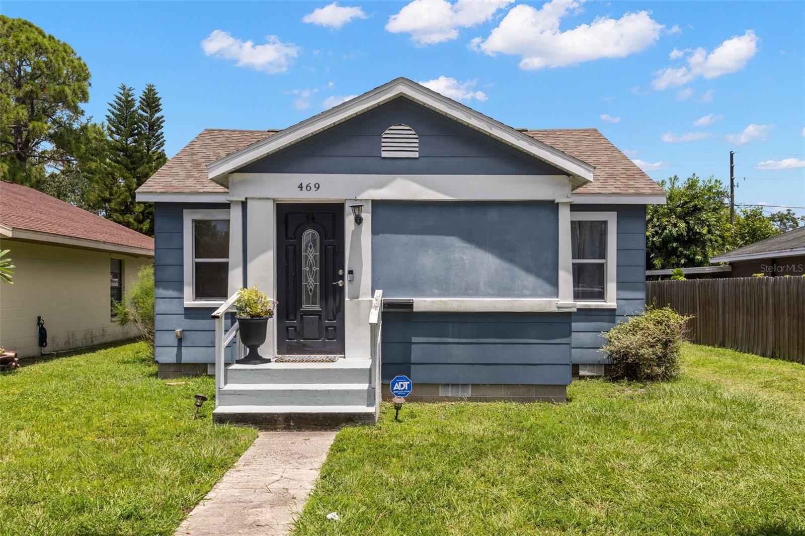 Come see this NE St. Pete Cutie! This 2 bedroom 2 bathroom bungalow absolutely nails the “feels like home” vibe the second you walk in. The open floor plan connects the living, dining and kitchen spaces with plenty of room for hanging out or hosting friends. The large kitchen has shaker cabinets, stainless steel appliances and tons of counter space, with its very own side entry-perfect for unloading the groceries! Step out to your covered patio ideal for lazy evenings, BBQs or a glass of wine rain or shine. The guest room has a big walk-in closet and loads of natural light with a guest bath conveniently located in the hallway while your main suite features double closets and a private bath to keep things stress-free. Both bathrooms are updated with new sinks, vanities and travertine tile. Inside laundry room and an extra storage shed? Yup, it's got that too! The fully fenced yard offers privacy and there's even room to add a pool. The pull-through driveway from street to alley offers room for all the toys-boat, RV, you name it! Remodeled in 2016 to include the roof, plumbing, electrical and a new AC in 2024. Flood Zone X and no damage from last year's storms plus an ASSUMABLE VA LOAN with a 2.99 rate!!! All of this in one of the most convenient spots in St. Pete–just minutes to Downtown and I-275 with Publix, Whole Foods, Crunch Fitness, shopping, restaurants, Allendale Park and dog park all within a short distance. Schedule your showing and lock this one in before it's gone!