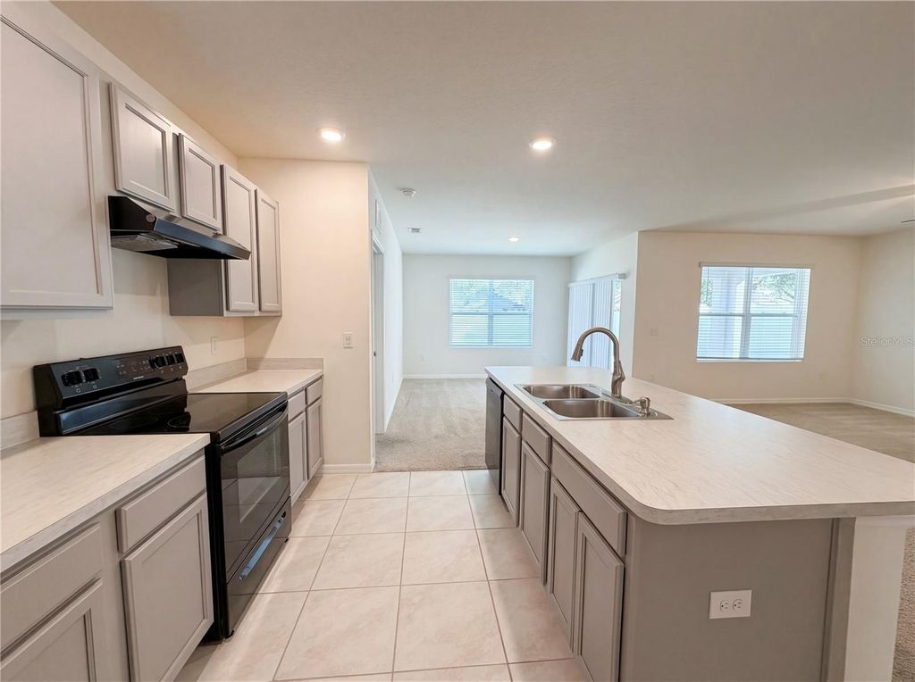 Photo of 608 Astor Drive, Haines City, FL 33844 (MLS # O6394831)