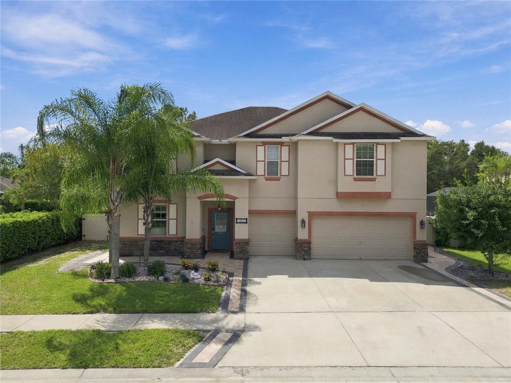 Photo of 13856 Crest Lake Drive, Hudson, FL 34669 (MLS # TB8554145)