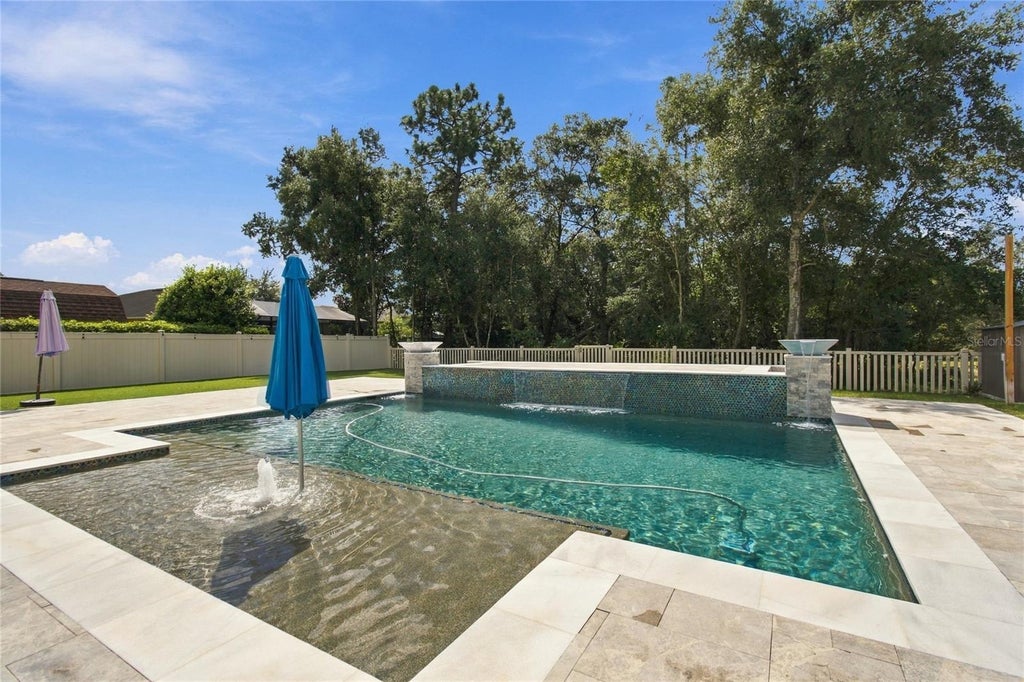 Photo of 13856 Crest Lake Drive, Hudson, FL 34669 (MLS # TB8554145)