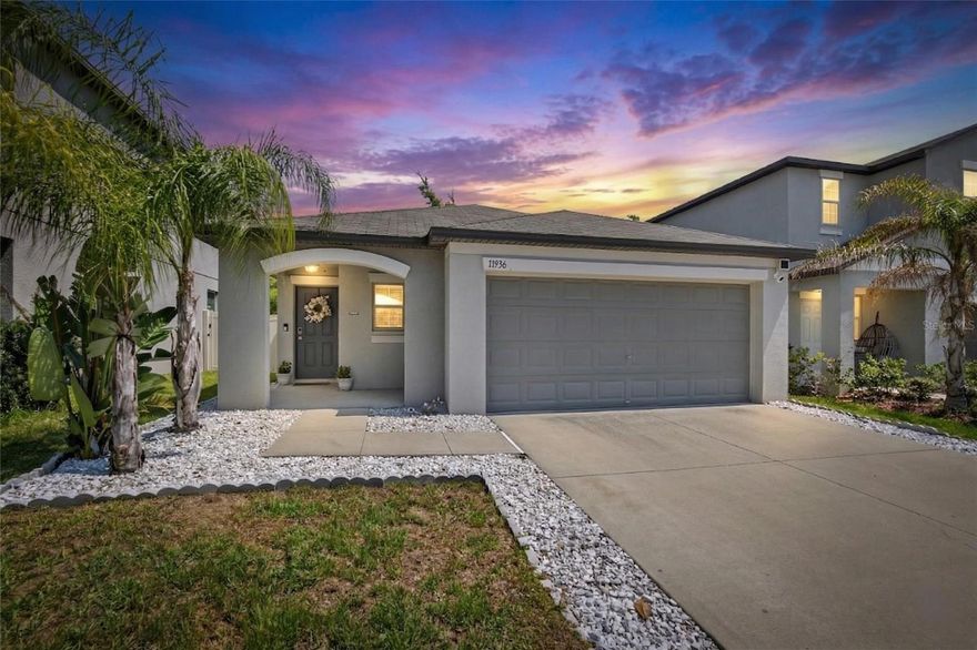 Beautifully updated 3 bedroom, 2 bathroom split plan home loaded with modern upgrades and energy-efficient features!  This move-in ready property offers fresh interior paint (with a 2 year warranty), luxury tile flooring throughout the bedrooms and absolutely no carpet.  The kitchen and bathrooms feature updated sink, modern plumbing fixtures and an upgraded garbage disposal.  Additional intereior upgrades include new ceiling fans and stylish new door handles throughout.  Enjoy peace of mind with a new water heater with WiFi and leak guard technology, a water softender system, and a MyQ smart garage door opener.  The home also includes a Ring security system with three cameras covering the garage, front door, and backyard.  Energy efficiency shines with fully paid-off solar panels and battery backup, plus a convenient EV charging plug.  The current owner reports an electric bill as low as $13!  Step outside to a premium lot with no rear neighbors, offering added privacy.  The exterior has been refreshed with new landscaping, plus fresh gravel and a weed barrier installed alongthe side yard for low-maintenance living.  This home combines technology, sustainability, and stylish updates - ready for its next owner!  Call today to view this immaculately lovely home!