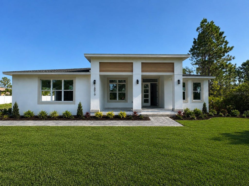 Photo of 18891 Netherland Street, Orlando, FL 32822 (MLS # O6438725)