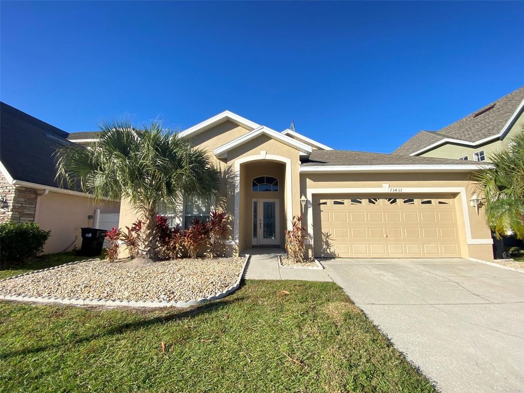 Photo of 13431 Meadow Bay Loop, Orlando, FL 32824 (MLS # O6378935)