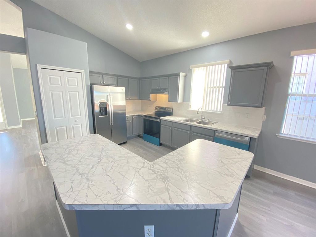 Photo of 13431 Meadow Bay Loop, Orlando, FL 32824 (MLS # O6378935)