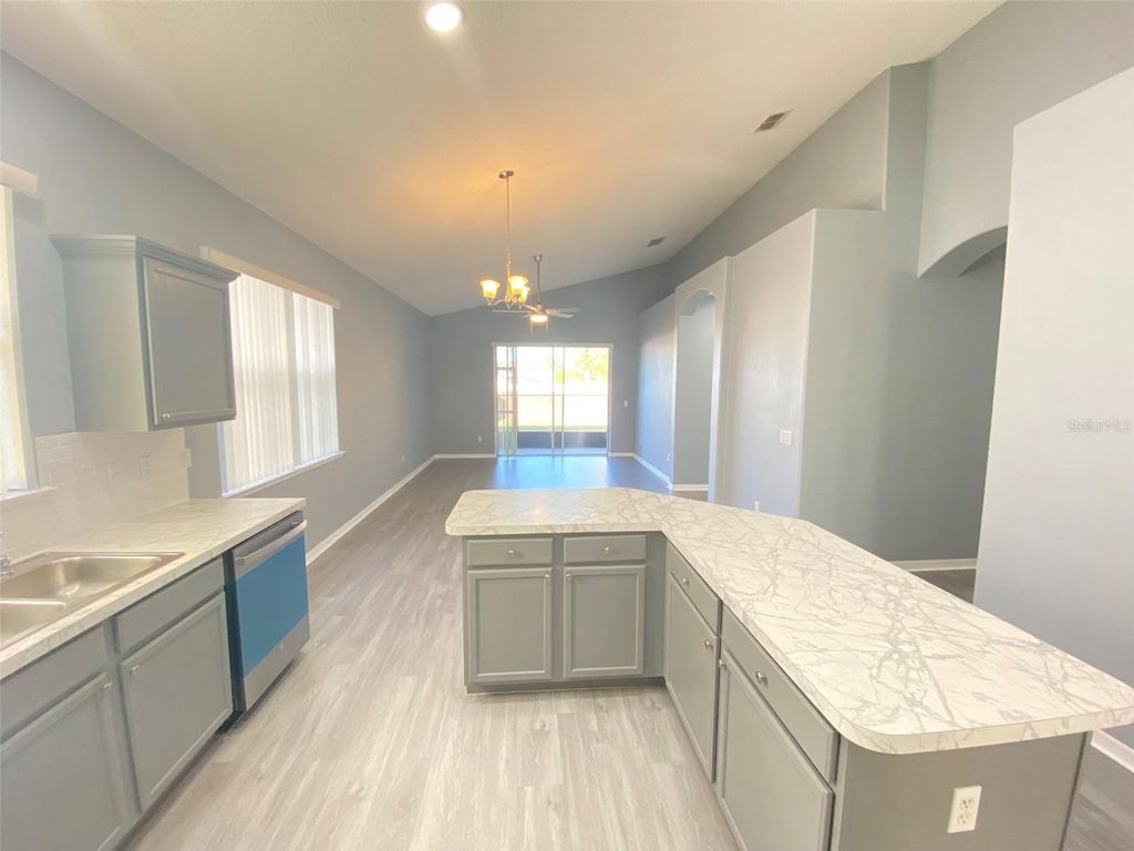 Photo of 13431 Meadow Bay Loop, Orlando, FL 32824 (MLS # O6378935)