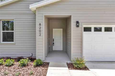 Photo of 8202 SW 123rd Terrace, Dunnellon, FL 34432 (MLS # O6308001)