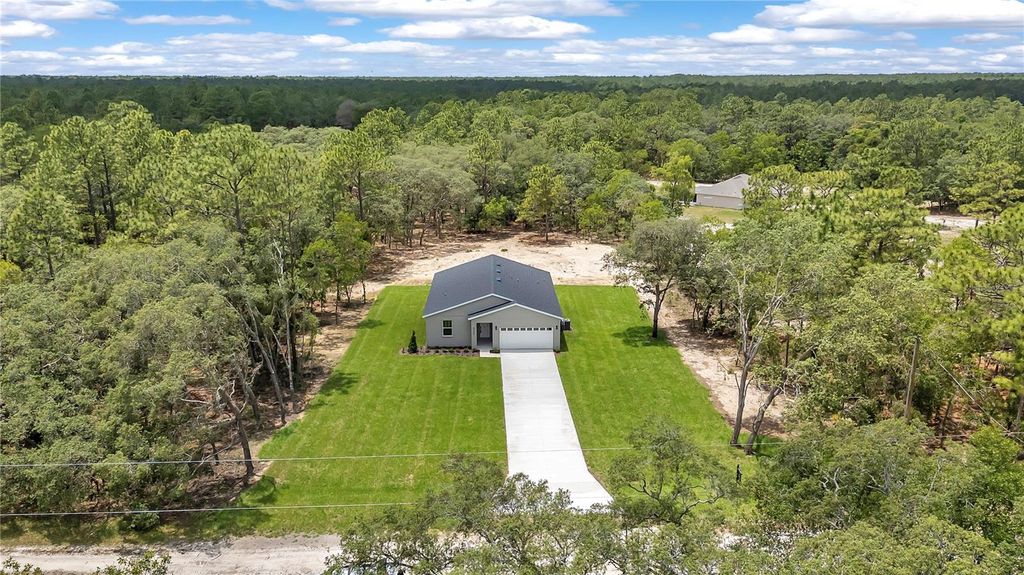 Photo of 8202 SW 123rd Terrace, Dunnellon, FL 34432 (MLS # O6308001)