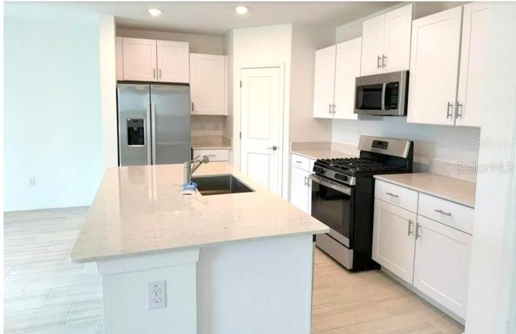 Photo of 2554 Leonia Lane, Zephyrhills, FL 33541 (MLS # TB8473418)