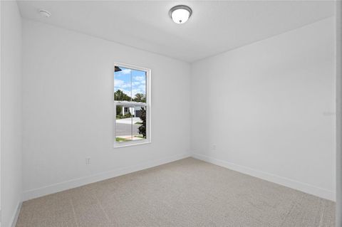 Tiny photo for 442 Turin Way, Lady Lake, FL 32159 (MLS # W7886348)