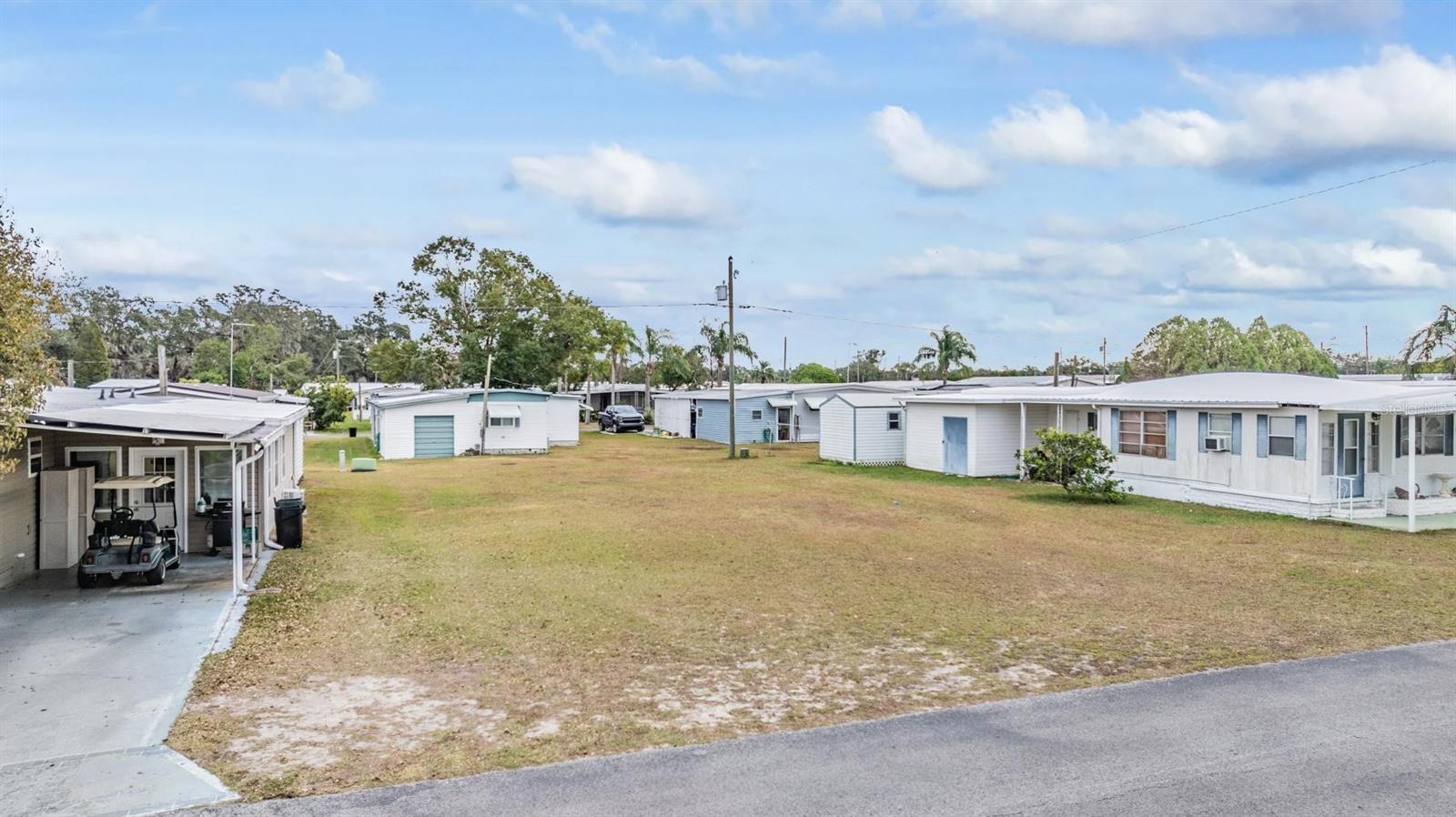 New Price! Build Your Dream Home in Betmar Acres – A Premier 55+ Community! Looking to create your perfect manufactured home in a vibrant and active 55+ community? This spacious 56’ x 95’ vacant lot in Betmar Acres is a rare find! Own the land and take advantage of everything this sought-after community has to provide. Property Highlights: Utilities Ready: Electric, public water, and septic installation available, plus access to high-speed internet. Affordable Fees: Annual fee of just $435.00. Prime Location: Close to walking trails and the indoor shuffleboard courts for easy access to community amenities.
Betmar Acres Amenities: Golf & Recreation: 27 holes of golf, 2 swimming pools, hot tubs, miniature golf, and enclosed shuffleboard courts.
Active Lifestyle: Tennis courts, pickleball courts, basketball court, bocce courts, and bingo. Clubhouses & More: 3 clubhouses, a library, game rooms for billiards, table tennis, and board games, plus scenic walking paths. Conveniently Located: Situated near SR 54, this property is just minutes from shopping, dining, medical facilities, and Florida’s stunning beaches. Tampa International Airport is only a 40-minute drive, making travel a breeze. Don’t miss the opportunity to design your dream home in this fantastic community. Schedule your visit today and see why Betmar Acres is the perfect place to call home!