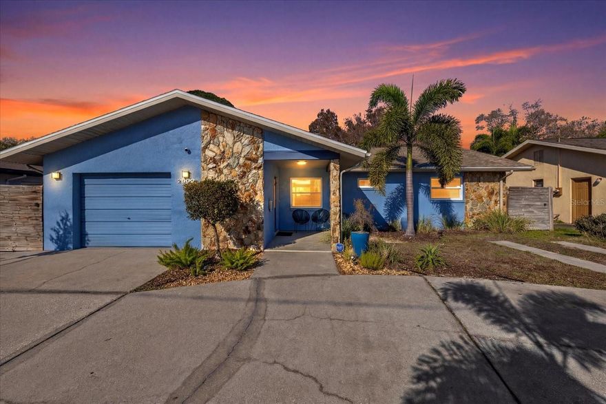 Welcome to elevated Northwest St. Pete living—where smart technology, designer finishes, and an active lifestyle come together just blocks from Walter Fuller Park.

Professionally styled by Doma Furnishings, this fully upgraded smart home is completely turnkey for the buyer who wants luxury without the renovation timeline. The heart of the home is a showpiece kitchen designed for entertaining—granite countertops, marble backsplash, built-in wine fridge, and a dedicated bar area that flows effortlessly into the main living spaces.
Integrated Lutron smart lighting and whole-home surround sound allow you to control ambiance from your phone—perfect for hosting, relaxing, or working from home. Two true primary suites offer flexibility for guests, multigenerational living, or a private office retreat—each with spacious walk-in closets.

Natural light pours into the freshly painted interior, anchored by a cozy fireplace that adds warmth and character.
Behind the scenes, the big-ticket items are DONE:Brand New Roof (August 2025), 2022 A/C, New Electrical Panel, New Water Heater and Water Softener. Outside, enjoy a backyard built for the Florida lifestyle—outdoor shower, circular drive, and dedicated paved boat parking (rare for this area). The oversized garage includes extra storage and even a secondary refrigerator. Just blocks from St Petersburg Parks and Recreation, pickleball courts, trails, and recreation amenities, this location attracts buyers who want to live actively while staying minutes from downtown and the beaches. No HOA. No CDD. Furniture negotiable for a truly seamless move. This is the kind of Northwest St. Pete home that rarely comes available—fully upgraded, lifestyle-driven, and move-in ready.