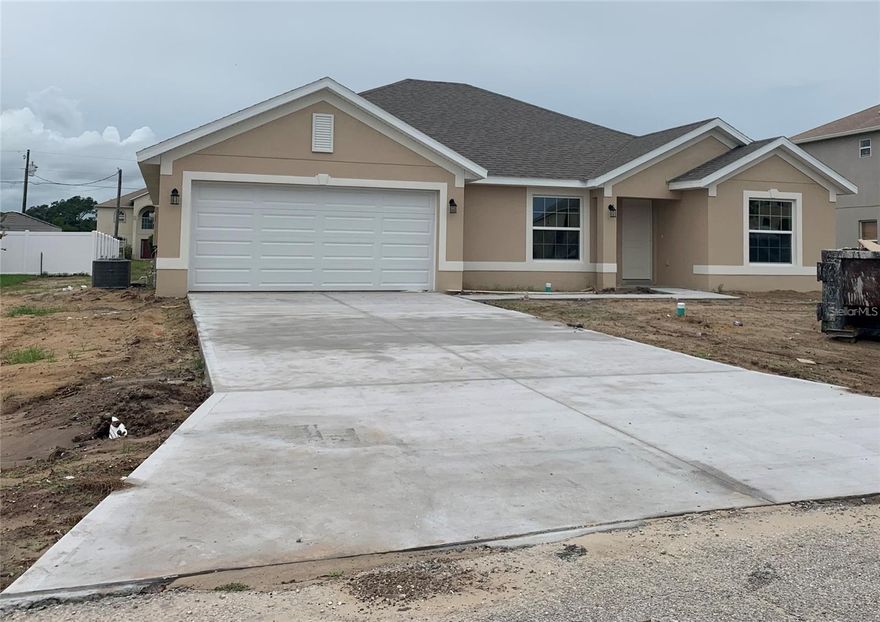 Lovely 4 bed, 2 bath one story home! Open split floor plan that feels much larger than the actual square footage. The kitchen is open to the family room, newer appliances (2021), a large breakfast bar, as well as a large interior laundry room. This home also features a large living space. The master bath has tall vanity with double sinks as well as a wide shower with glass door enclosure & double closets in master bedroom. This home has lovely vaulted ceilings! Easy access to major roads, shopping, restaurants, medical and Sunrail in Poinciana while still maintaining that rural Central Florida feel. Don’t miss the opportunity to live in this serene location.