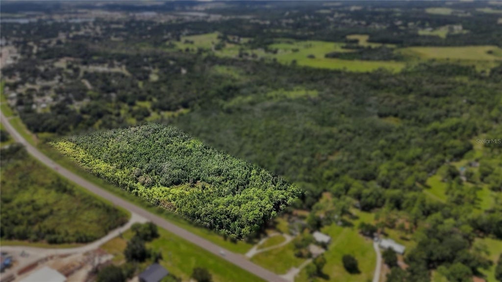 Photo of 0 Commonwealth Avenue N, Polk City, FL 33868 (MLS # TB8549304)