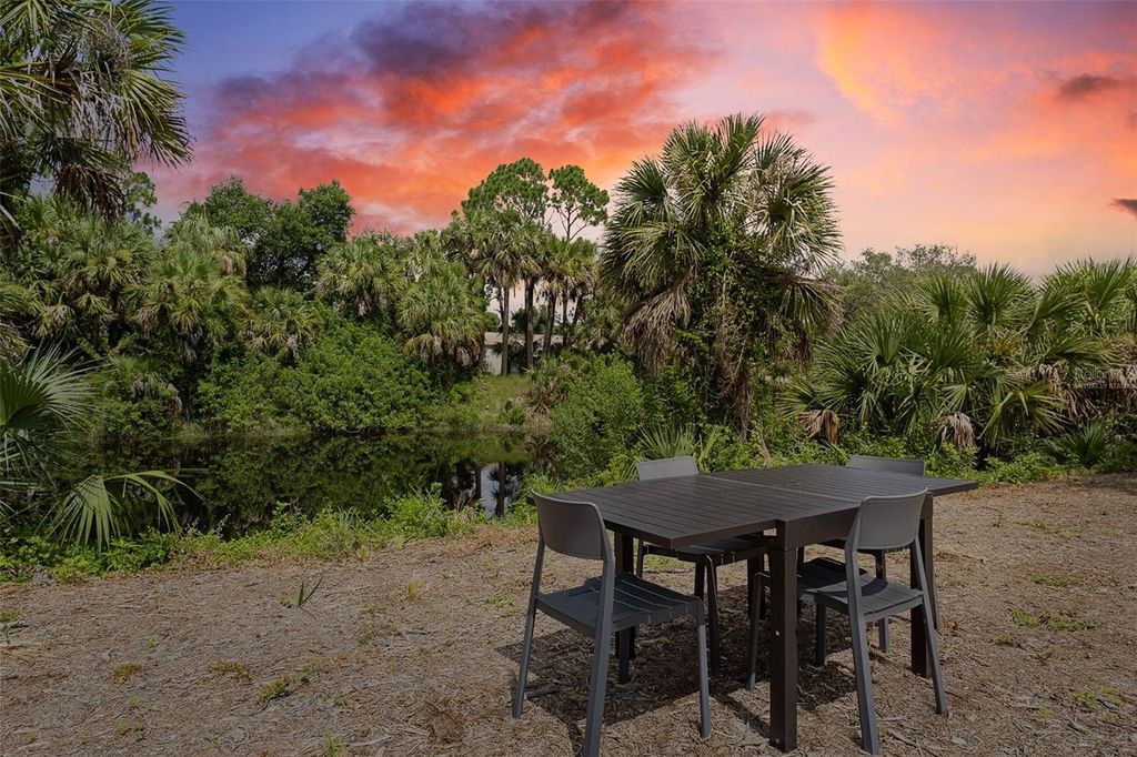 Photo of 295 Ravenswood Boulevard, Port Charlotte, FL 33954 (MLS # TB8411246)
