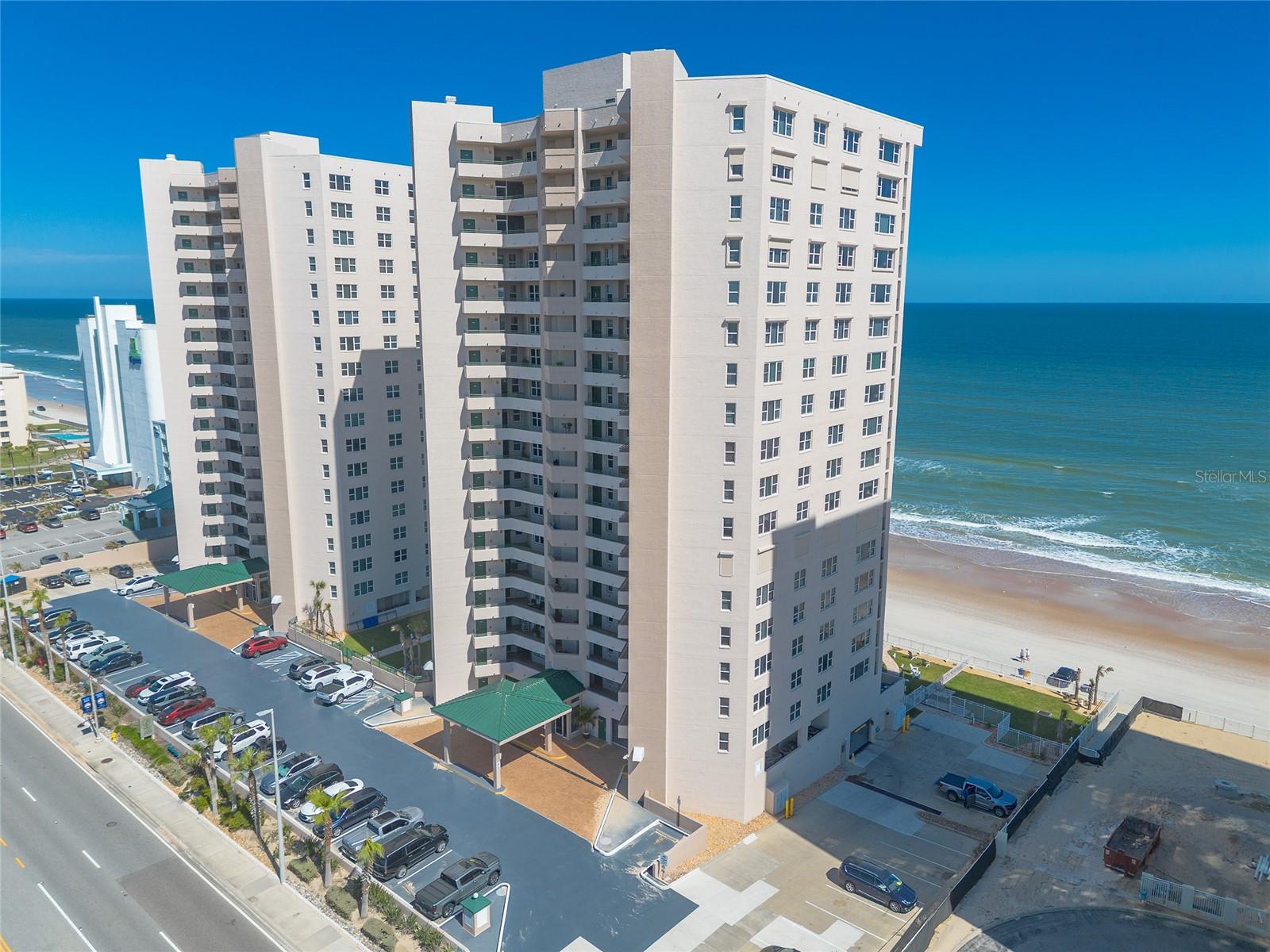 Assumable mortgage of 578,651.00 at 5.6 percent! Experience the epitome of oceanfront luxury in this stunning 11th-floor, 3-bedroom, 3-bathroom condo located in the highly sought-after DiMucci Twin Towers. Boasting breathtaking, unobstructed views of both the Atlantic Ocean and the Intracoastal Waterway, this residence offers an unparalleled coastal lifestyle. Step inside to find tile flooring throughout the entire unit, complemented by elegant crown molding for a touch of sophistication. The open floor plan ensures you never miss a view, with the ocean visible directly from the kitchen. Designed for both style and functionality, the kitchen features a breakfast bar, stainless steel appliances, granite countertops, and custom wood cabinetry with ample storage space. Wake up to the sound of waves in the oceanfront master suite, complete with double walk-in closets and an ensuite bathroom featuring a soaking tub, walk-in shower, and dual vanities. The second master suite also offers spectacular ocean views, generous space for a king-sized bedroom set, and a walk-in closet. The third bedroom provides flexibility for guests or a home office. Designed for entertaining, the spacious living room flows seamlessly onto the private oceanfront balcony, where you can soak in the magnificent Atlantic views and enjoy the soothing sea breeze. As a resident of DiMucci Twin Towers, you'll have access to resort-style amenities, including two oceanfront pools, two spas, a spacious clubhouse, a state-of-the-art fitness center, secured building access, and assigned underground parking. Don't miss this rare opportunity to own a piece of paradise in one of the most desirable oceanfront communities. Schedule your private showing today! All information deemed accurate but cannot be guaranteed. Air handler 2023 and hot water heater 2022. Condo comes with Hurricane Shutters.