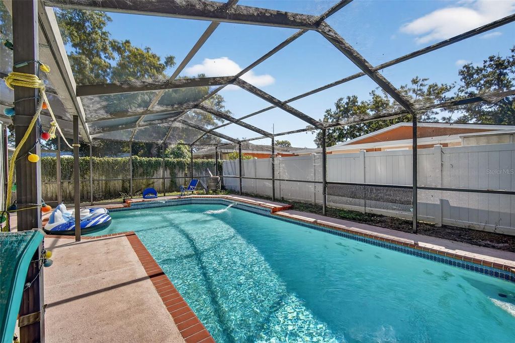 Photo of 2516 W Marquette Avenue, Tampa, FL 33614 (MLS # O6358899)