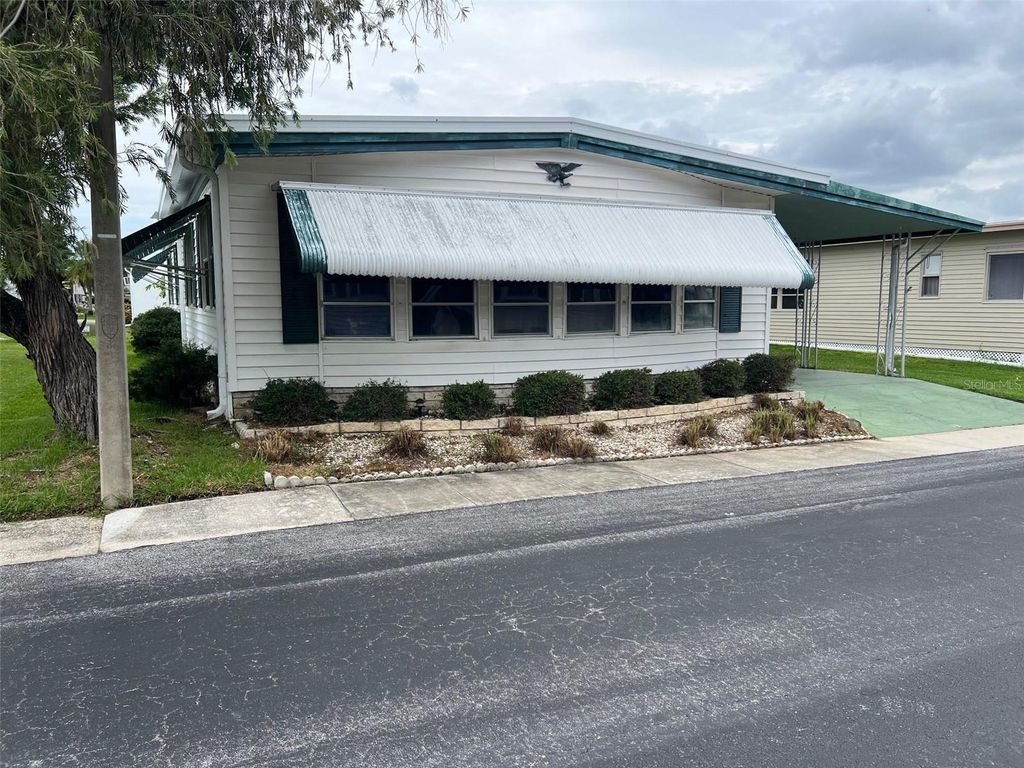 Photo of 760 Royal Palm Circle, Largo, FL 33778 (MLS # TB8408556)